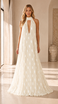 Ivory pleated halter maxi dress with deep V neckline and white dot pattern front view