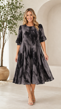 Front view of charcoal tie-dye midi A-line dress with puff sleeves
