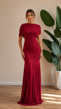 Front view of burgundy ruched draped mermaid maxi gown