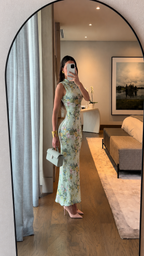 Side view of mint floral sleeveless bodycon long dress