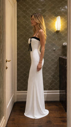 Side profile view of White Elegance Rose Bow Cami Maxi Dress