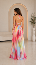 Back view of multicolor watercolor halter maxi dress with open back and tie neck