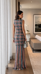 Back view of a multicolor sleeveless textured maxi dress with mermaid silhouette
