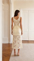 Back view of cream sleeveless lace peplum midi dress set with scoop back