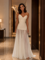 Front full-length view of ivory strapless sweetheart formal gown with textured upper body and sheer floor-length hem