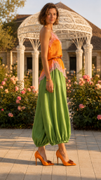 Orange and green lace trim cami jumpsuit side view with balloon leg silhouette