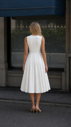 Back view of the white fit-and-flare midi dress