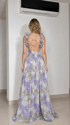 Back view showing lace-up details on lavender floral maxi dress