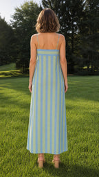 Back view of woman wearing blue striped maxi dress