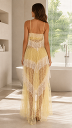 Back view of butter yellow spaghetti strap lace maxi dress