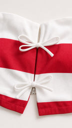 Close-up of front bow closures on the crop top