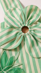 Close-up of halter neckline cut-out ring and fabric petals