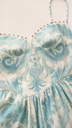 Close-up of sweetheart neckline and paisley pattern