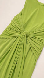 Close-up detail of the front knot and draping texture