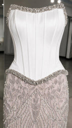 Close up detail of crystal trim and structured corset bodice