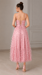 Blush pink 3D floral midi dress back view with lace-up detail