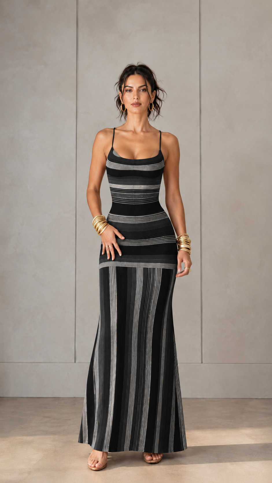 Front view of black striped knit maxi dress with scoop neck and spaghetti straps