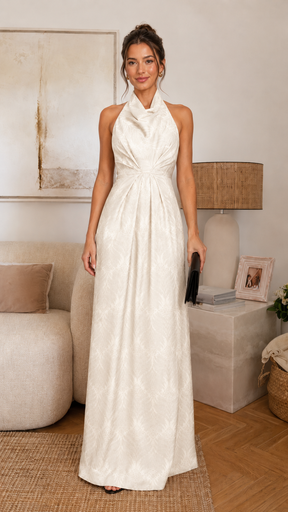Front view of ivory halter neck backless maxi evening dress