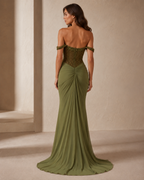 Back view of olive off-shoulder evening gown with fitted embellished bodice and train