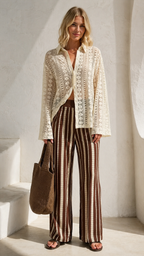 Full front view of cream lace-look shirt with brown and cream striped pants