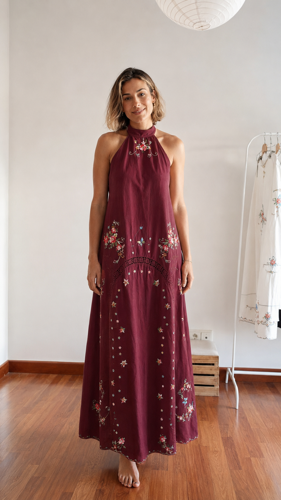 Front view of wine embroidered halter maxi dress