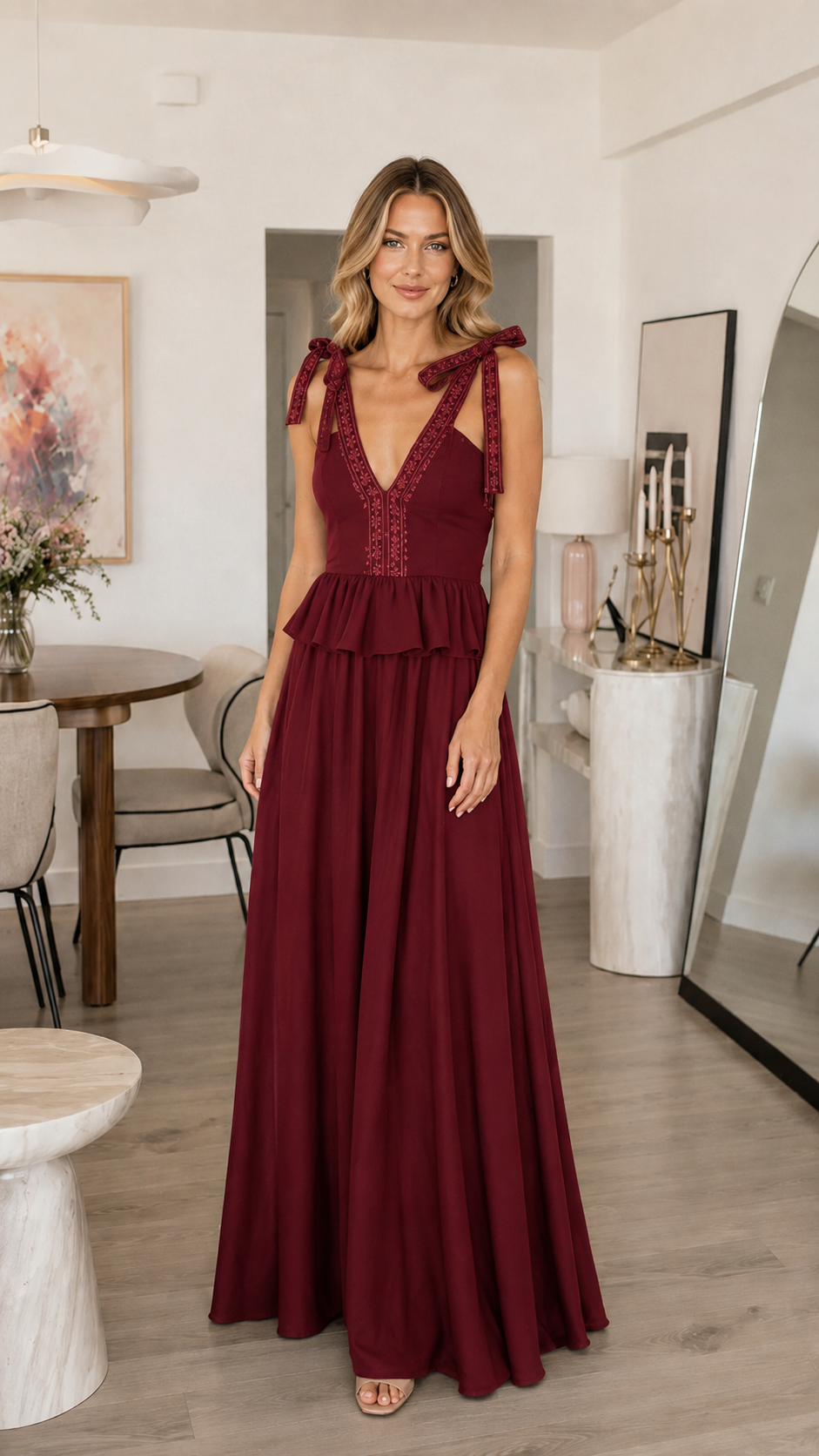 Front view of burgundy tie shoulder maxi dress with deep V neckline and tiered detail