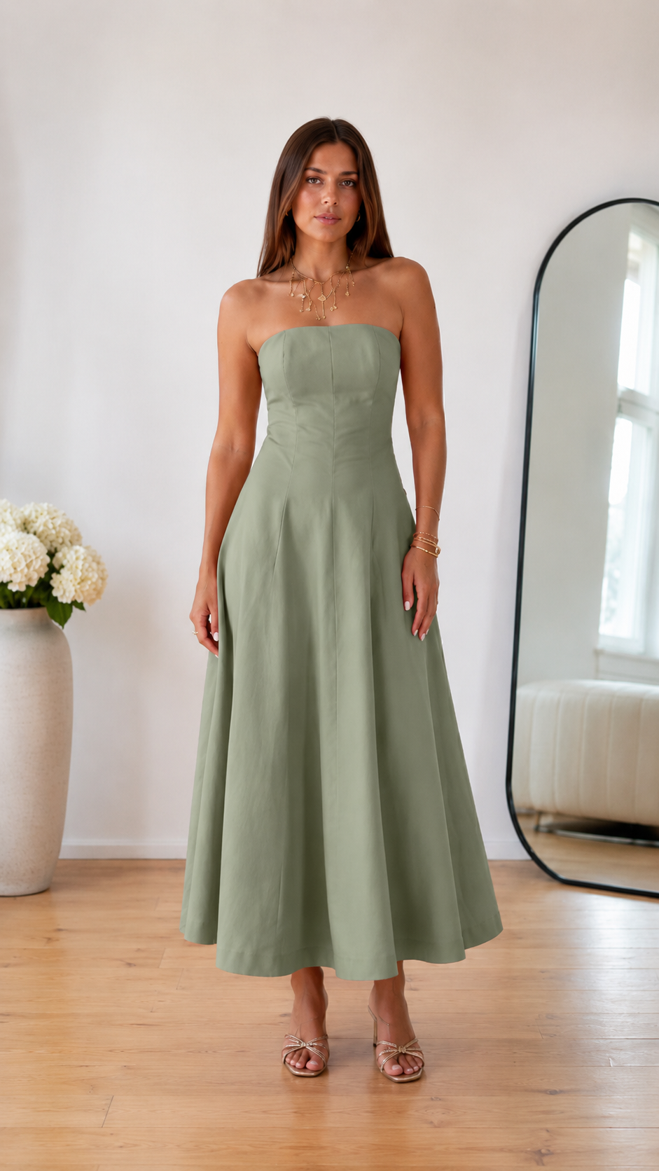 Front view of sage green strapless midi dress