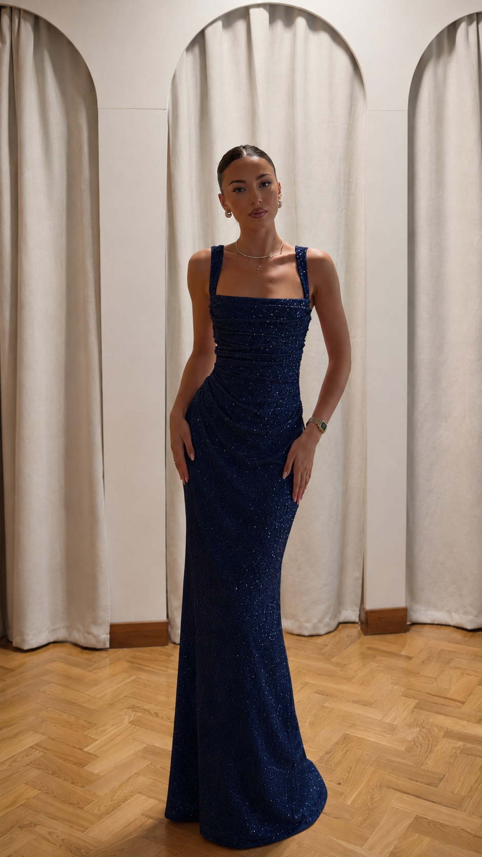 Front view of navy blue glitter square neck formal gown
