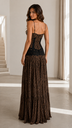 Back view of black brown maxi dress with slim straps and fitted bodice